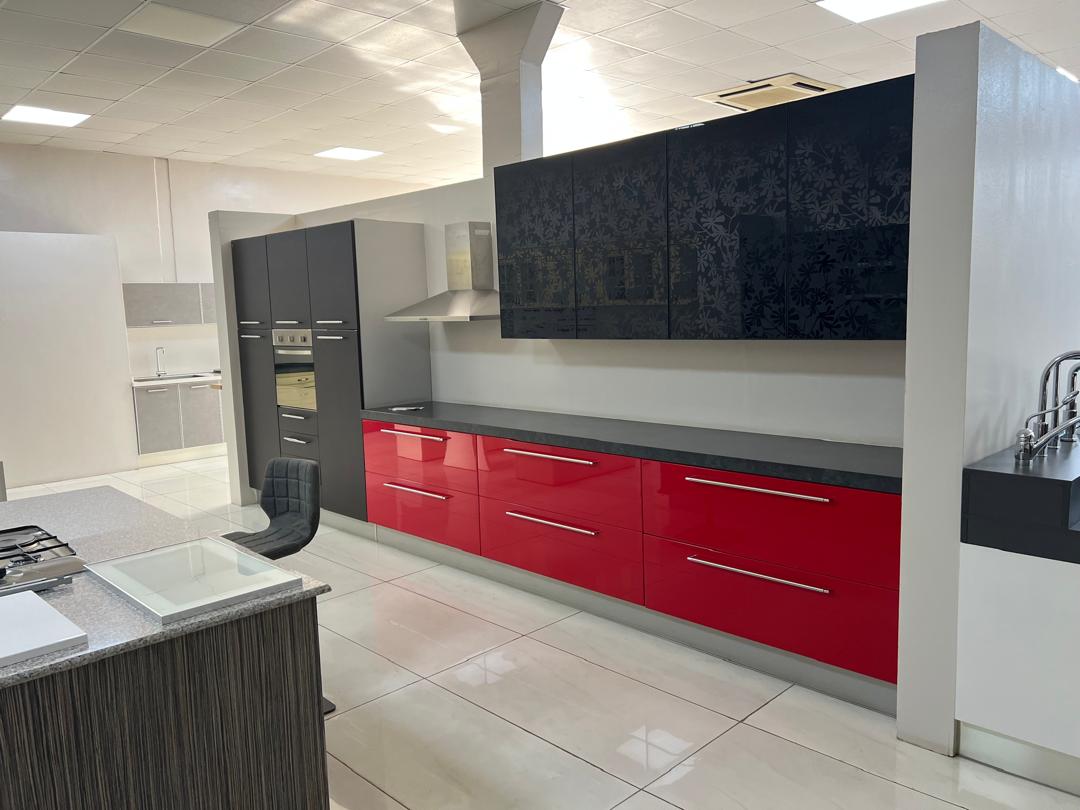 Glossy Red & Black Kitchen by ARTCO